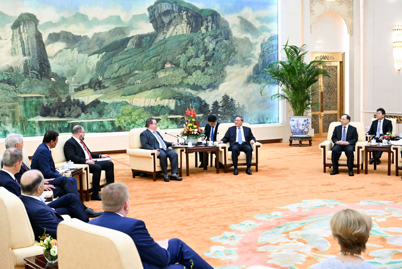 李强会见美中贸易全国委员会成立50周年访华团