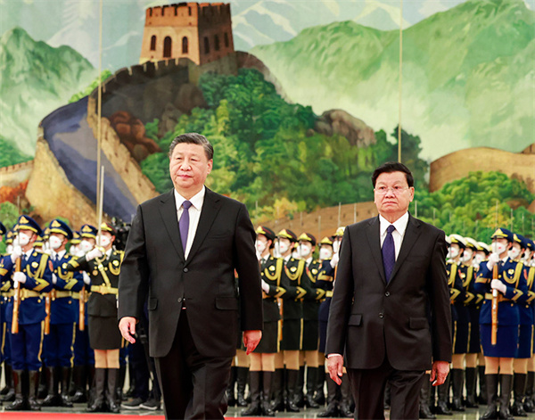 Xi holds talks with Lao president