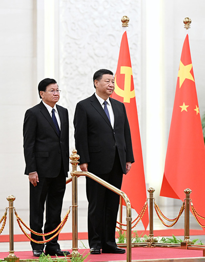 Xi holds talks with Lao president
