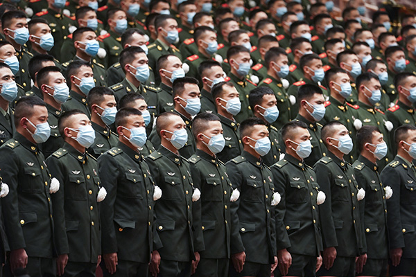 Memorial meeting held to mourn Jiang Zemin