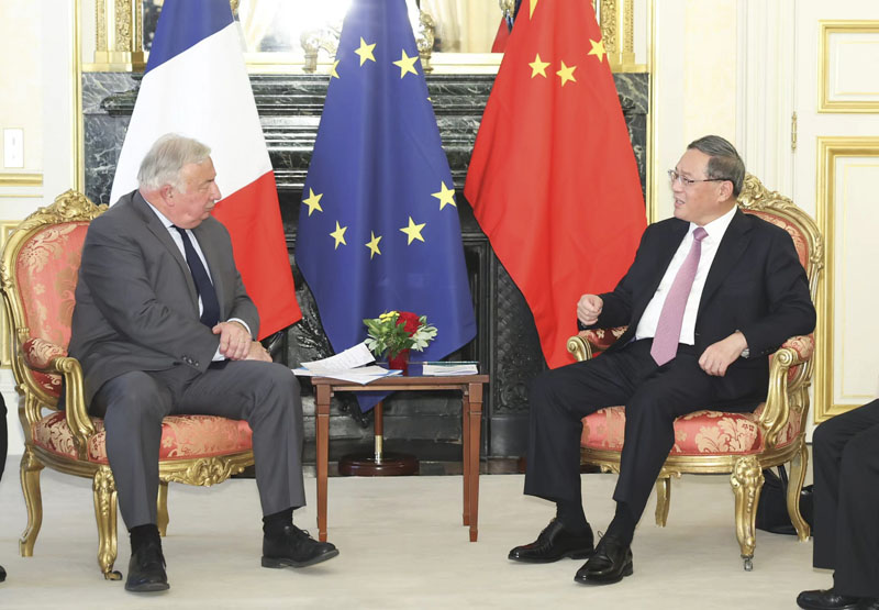李强会见法国参议长拉尔歇