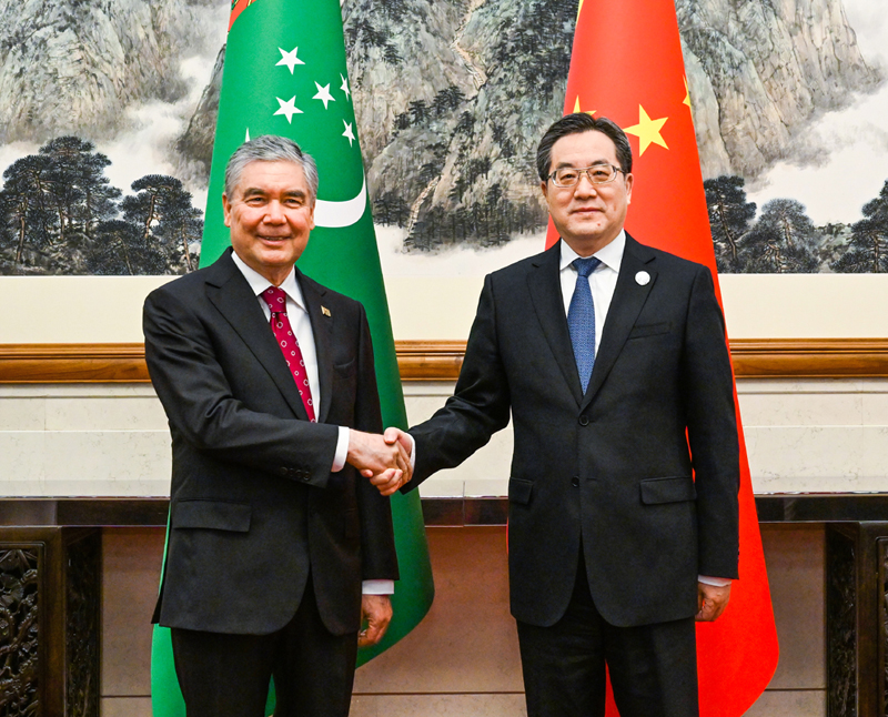 丁薛祥会见土库曼斯坦民族领袖、人民委员会主席别尔德穆哈梅多夫