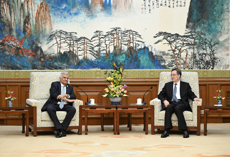 丁薛祥会见斯里兰卡总统维克拉马辛哈