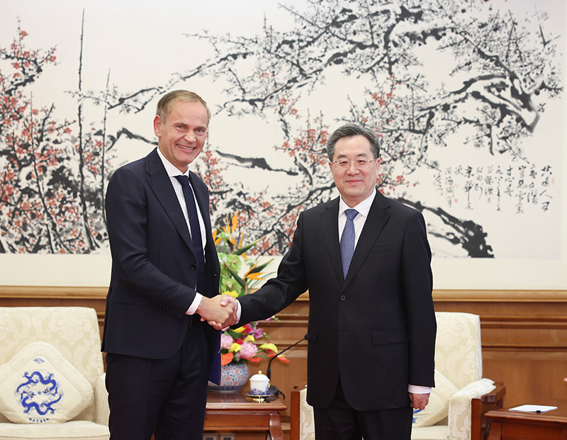 丁薛祥会见德国大众汽车集团管理董事会主席奥博穆