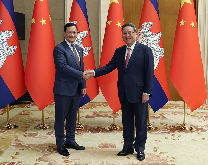 李强会见柬埔寨首相洪玛奈